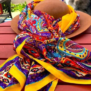 Source Unknown hand rolled bright yellow  scarf w colourful border 100” by 54”.